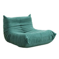 Fauteuil compressé en velours vert NOMA