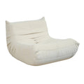 Fauteuil compressé en velours beige NOMA